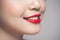 Red Lips closeup. Make up concept. Beautiful Perfect Lips.