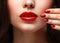 Red Lips and Nails closeup. Open Mouth