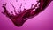 Red liquid splash. Flowing purple liquid beetroot juice or berry juice.