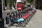 Red London double-decker bus and boris bikes