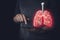 Red low poly human lungs on a black background. Abstract anatomy organ