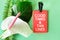 Red luggage tag green background