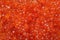 Red luxury caviar background. Healthy sea food. Gourmet food close up, appetizer. Caviar menu, snacks