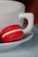 Red Macaron Cookie with White Coffee Mug