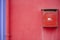 Red mail box.  Red decorative mailbox in the village of Burano in Venetian Lagoon. Colourful post box in Burano, Italy