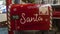 Red mailbox for Christmas letters. Santa mail. Christmas decorated mailbox for letters to Santa Claus.