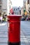 Red mailbox in street in london