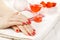 Red manicure with dekor. spa
