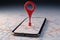 Red map pin icon displayed on 3D rendered smartphone screen