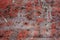 Red marble tile texture background with cracks