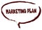 Red marker sketched speech bubble with MARKETING PLAN message.