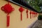 Red mascot hanging from a buddhist temple