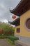 Red mascot hanging from a buddhist temple