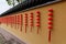 Red mascot hanging from a buddhist temple