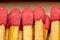 Red matchsticks. Red matchstick heads in close up