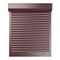 Red metal closed roller shutter. Front view.