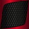 Red metal plate. Black metal background. Metal grid. Geometric pattern with triangles