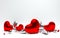 Red metall glossy hearts on white background with reflection effect. Saint Valentine`s day greeting card February 14 design