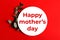 Red minimal background with text-happy mother`s day.Fresh eucalyptus branch near it.Border arrangement