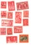 Red mint vintage postage stamps from around the world.