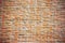 Red misty brick wall,modren interior rough texture with vignette for background