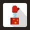 Red mitten jumping out from a box icon