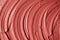 Red moroccan cosmetic clay texture close up.