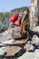 Red mountain backpack resting on a trunk