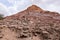 Red mountains containing a lot of copper surround the deep blue Hidden Lake near the Timna park,surrounded by mountains near