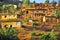 Red mud houses in a village in the African jungle