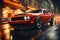 Red muscle car in motion on city streets with a blur