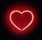 Red neon heart. Bright night neon sign on brick wall background with backlight.