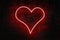 Red neon heart shaped sign on a brick wall