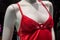 red nighty on mannequin in underwear fashion store showroom