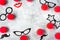 Red Nose Day, red noses with glasses, moustache. Toned deep negative