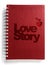 Red notebook with text love story