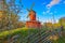 Red ochre colour wooden windmill