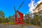 Red ochre colour wooden windmill