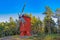 Red ochre colour wooden windmill