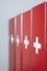 Red office folders with a white cross - swiss flag imitation