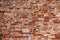 Red old brick wall texture loft grunge background. Italian masonry