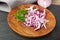 Red Onion Cuts on Wood Plate, Raw Purple Onion Slices, Chopped Purple Onion Pieces on Black