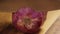 Red Onion - Cutting Red Onion In Small Pieces On Wooden Board - Close Up - Side Angle