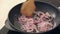 Red Onion Frying in a Pan