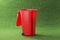 Red open garbage bin container