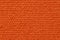 Red orange fabric with bumpy equal pattern texture macro