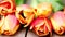 Red and orange tulip flowers in a row on wooden background in 4K VIDEO. Spring flowers.