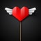 Red origami heart with wings