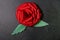 Red Origami Rose Blossom - Paper Art on Textured Background