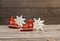 Red ornamental skates and white star ornaments for a christmas tree